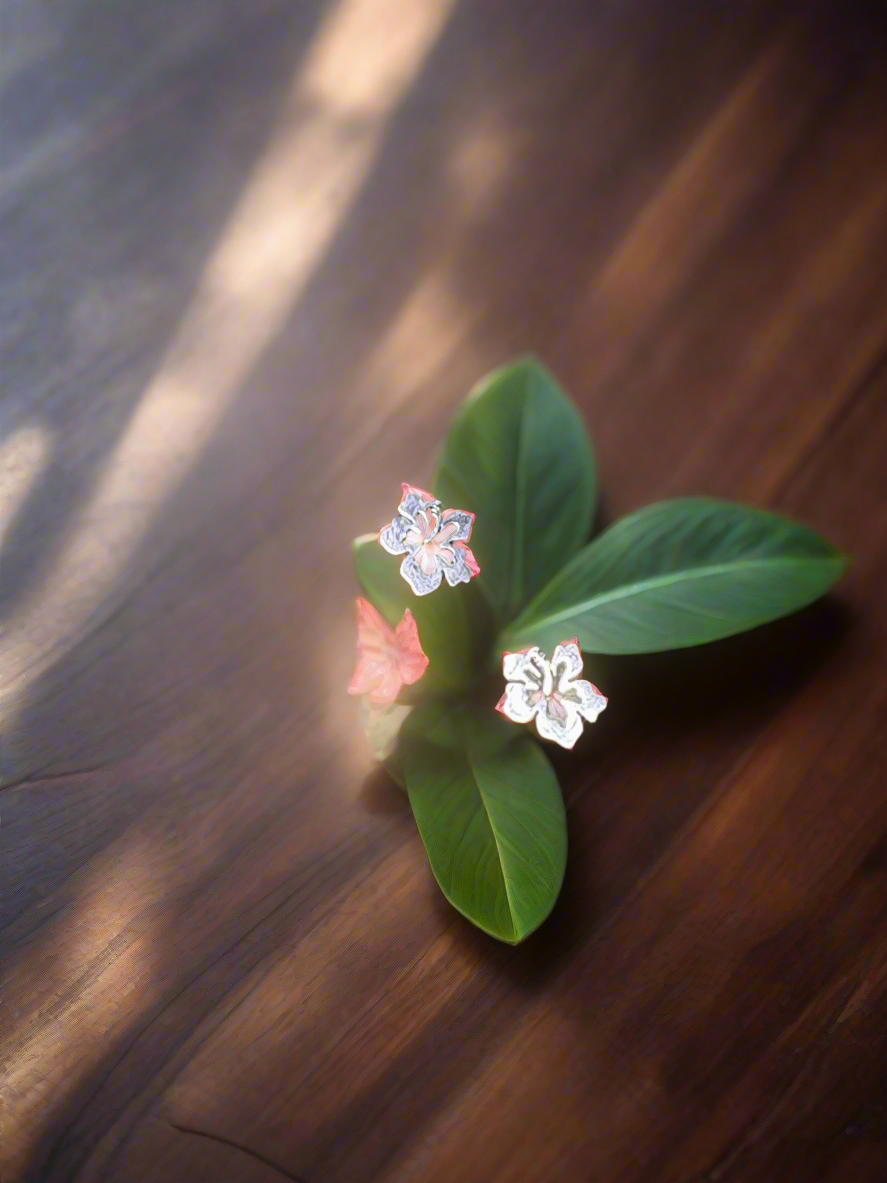 Flor Maga stainless steel earrings symbolizing Puerto Rican beauty and cultural pride