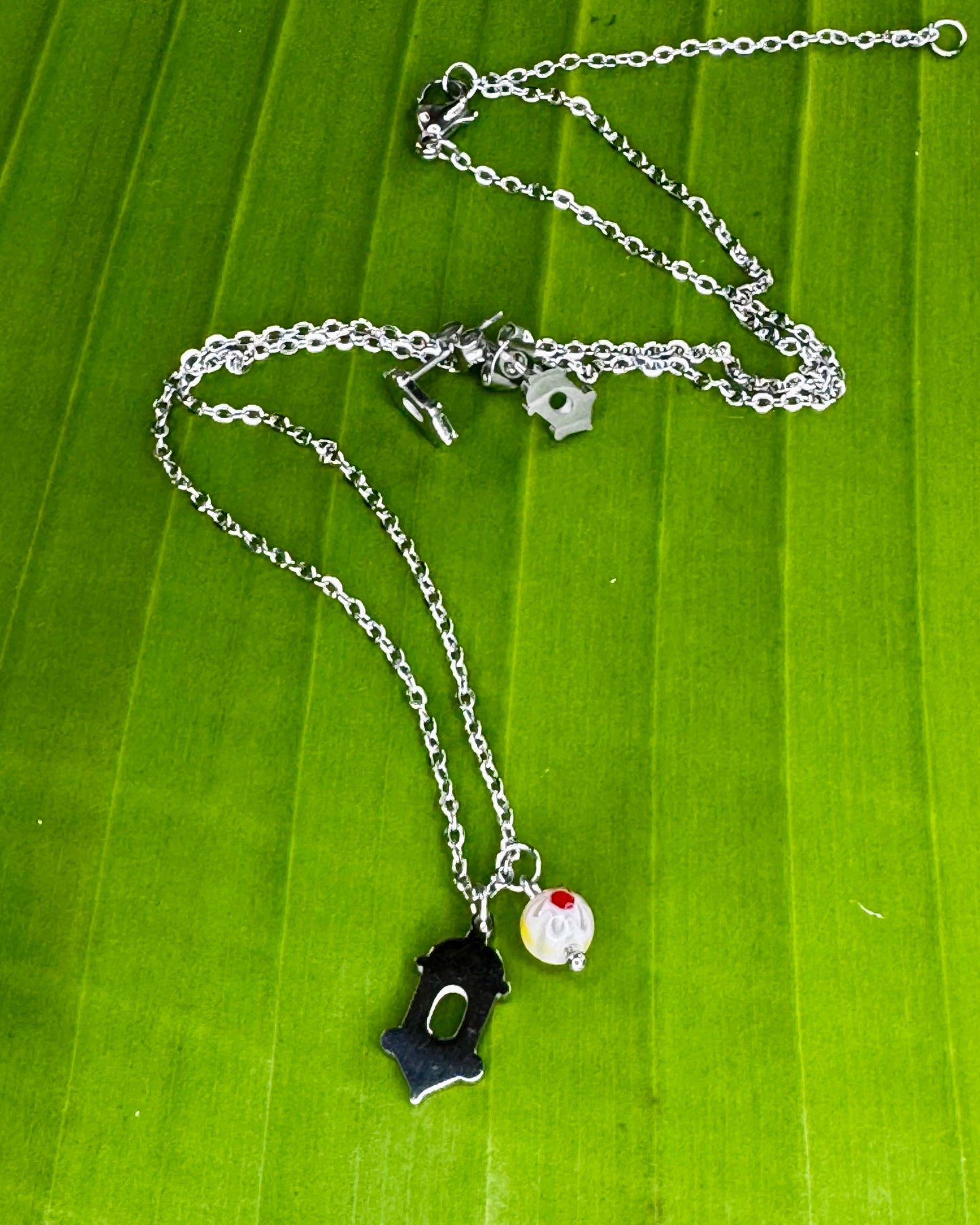 Old San Juan inspired El Morro charm necklace and earrings with Murano glass detail