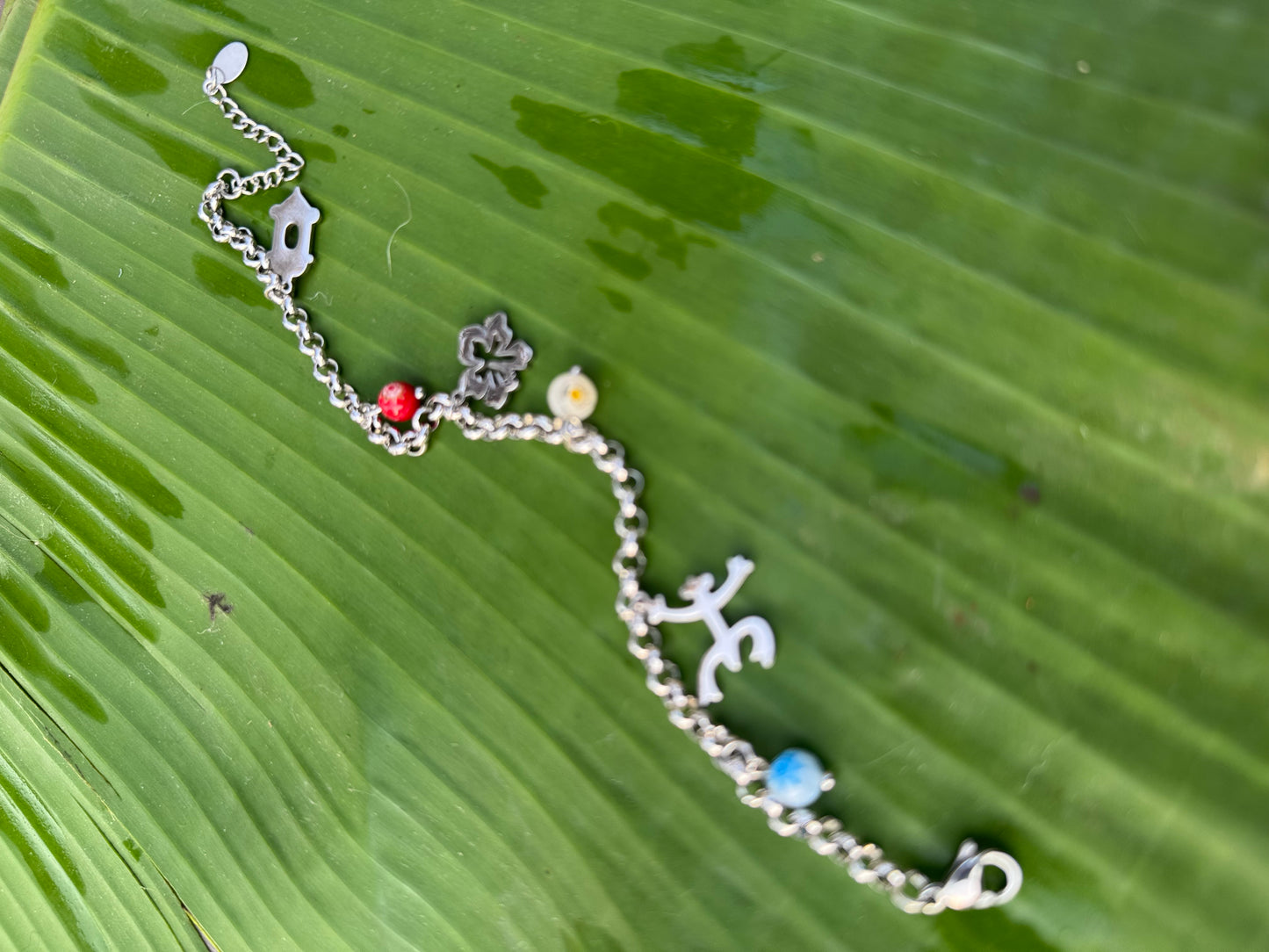 Puerto Rican stainless steel bracelet with Murano crystals and cultural heritage charms