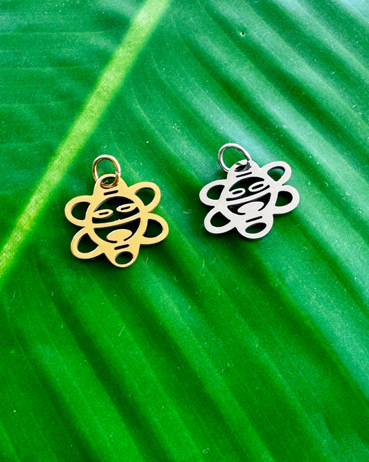 Sol Taíno stainless steel sun charm in gold and silver symbolizing life, energy, and protection
