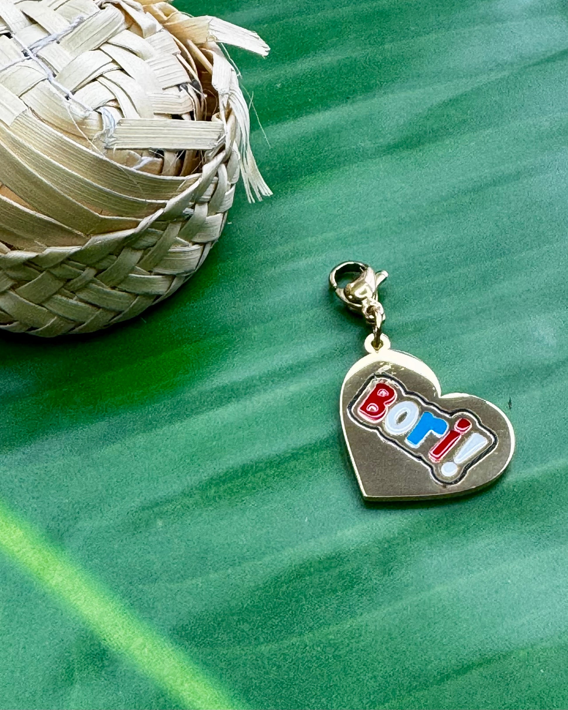 Puerto Rican Bori charm in gold stainless steel, Boricua heritage jewelry.