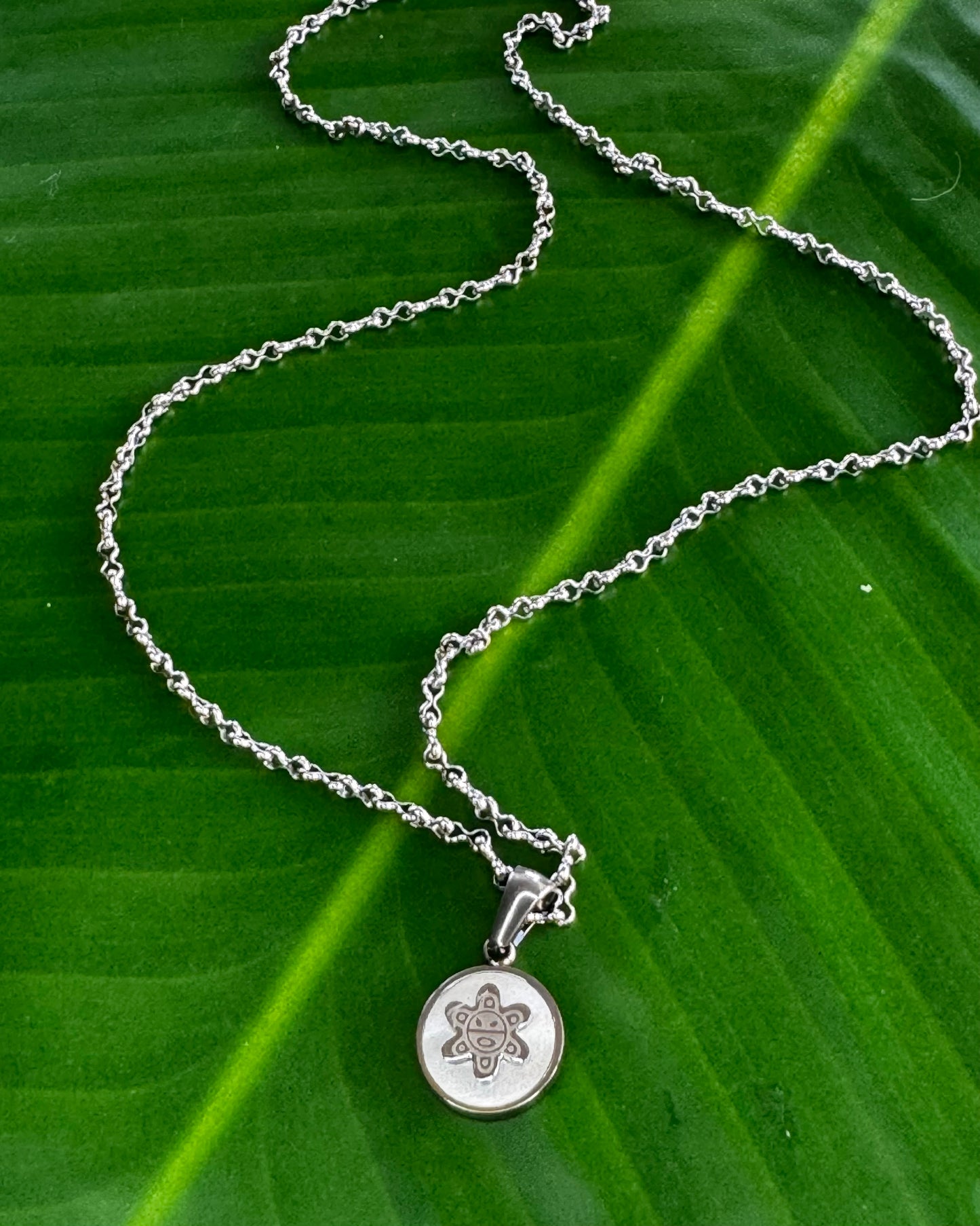 Sol Taíno Charm – Gold & Silver Stainless Steel with Madre Perla Back