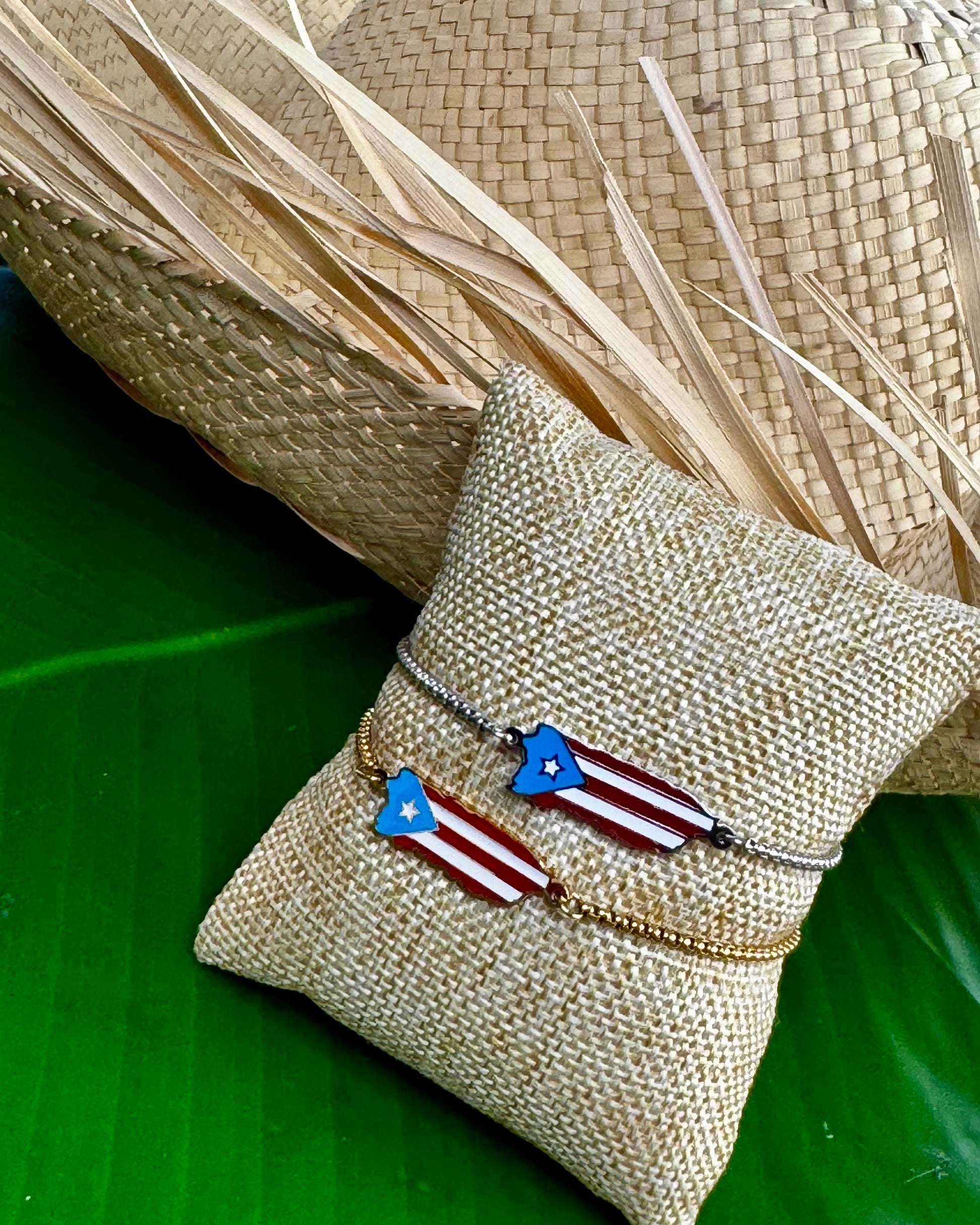Adjustable stainless steel bracelet in silver or gold with Puerto Rico island charm decorated in Puerto Rican flag colors