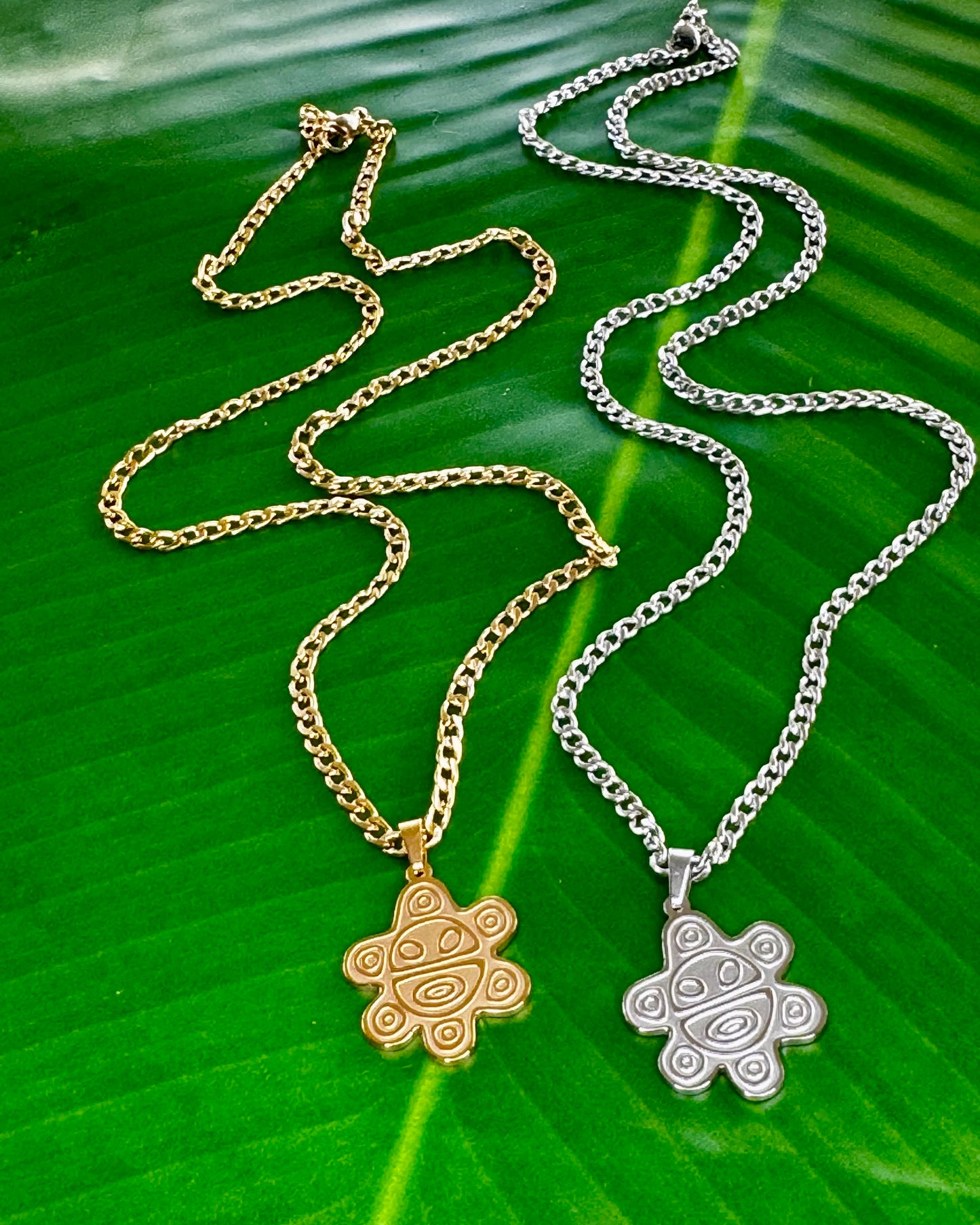 20-inch stainless steel necklace with a Sol Taíno charm in gold or silver, symbolizing Puerto Rican Taíno culture and heritage.