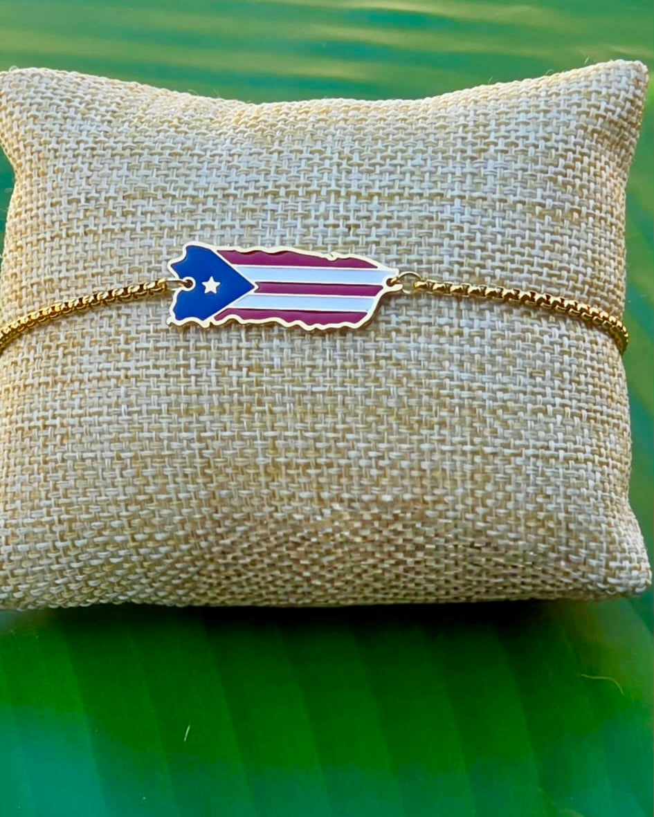 Stainless steel bracelet featuring the map of Puerto Rico adorned with the Puerto Rican flag, available in silver and gold colors.