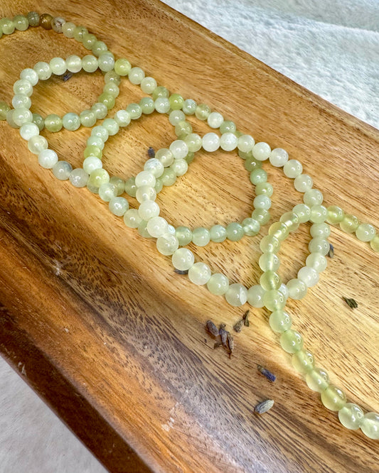 6mm Aventurine bracelet with earthy green tones, symbolizing luck, opportunity, and heart chakra balance.