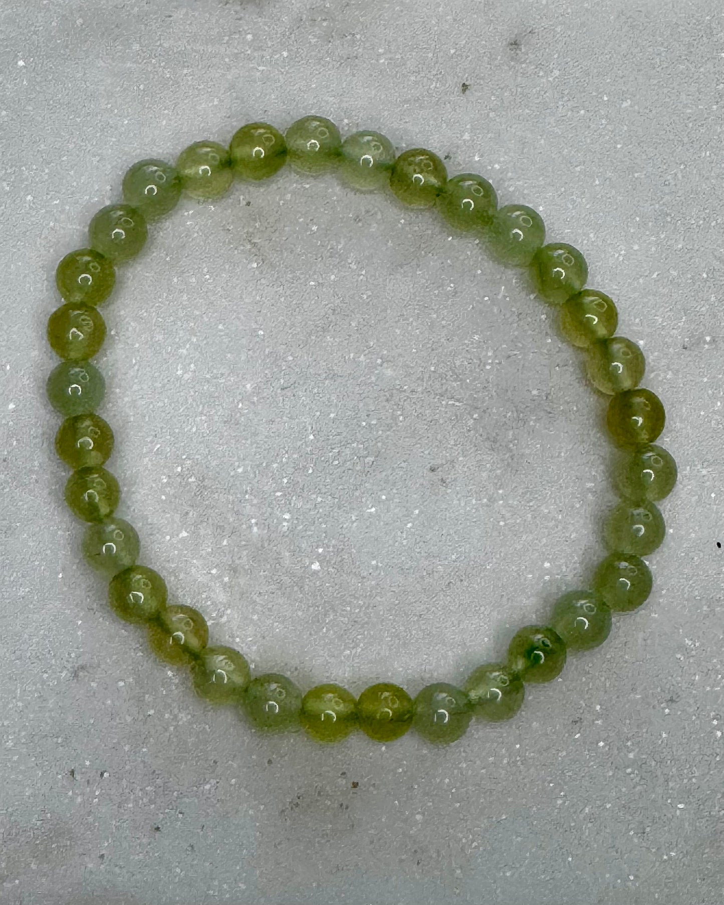 6mm Aventurine bracelet with earthy green tones, symbolizing luck, opportunity, and heart chakra balance.