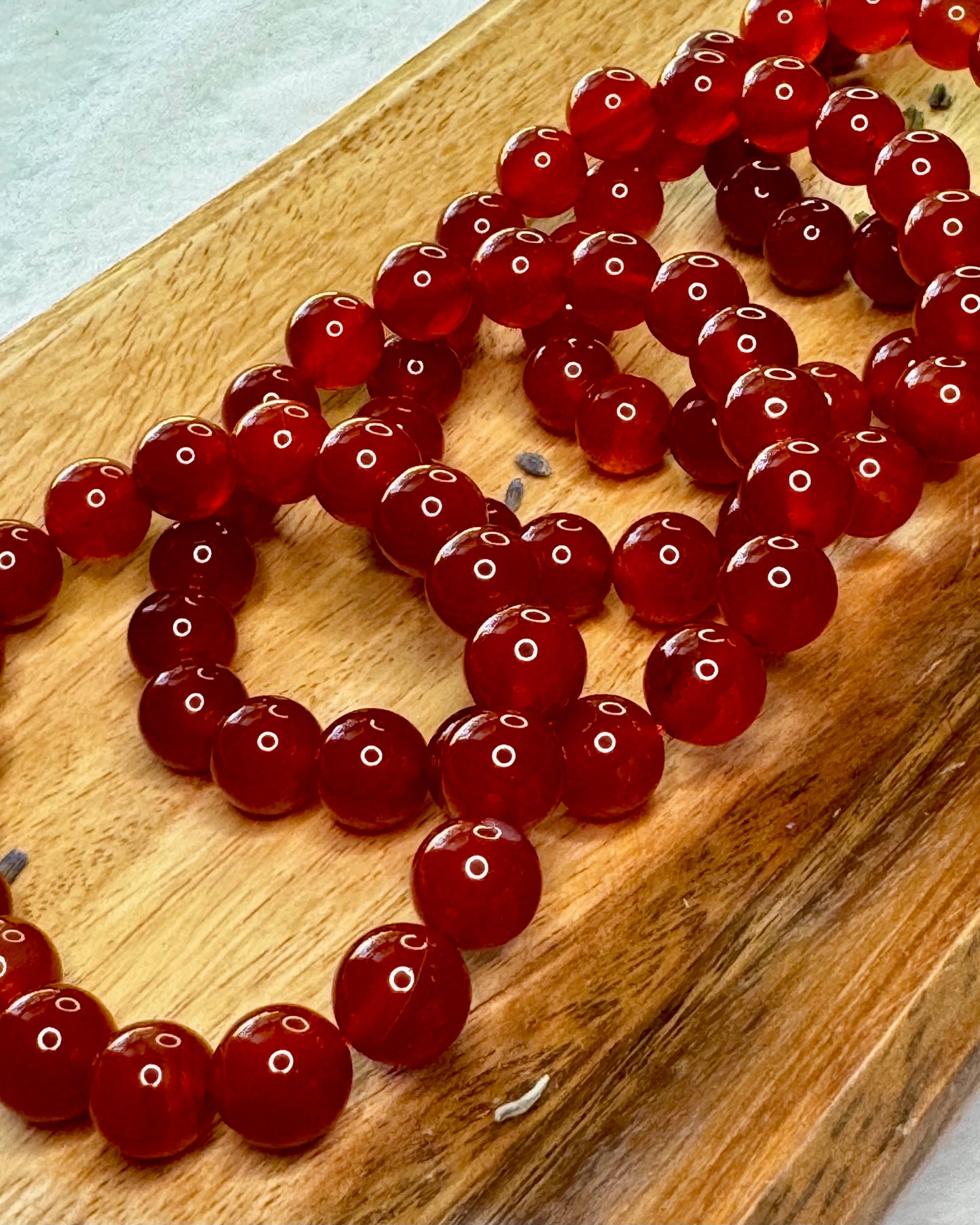 10mm Carnelian crystal bracelet symbolizing courage, vitality, and creative energy