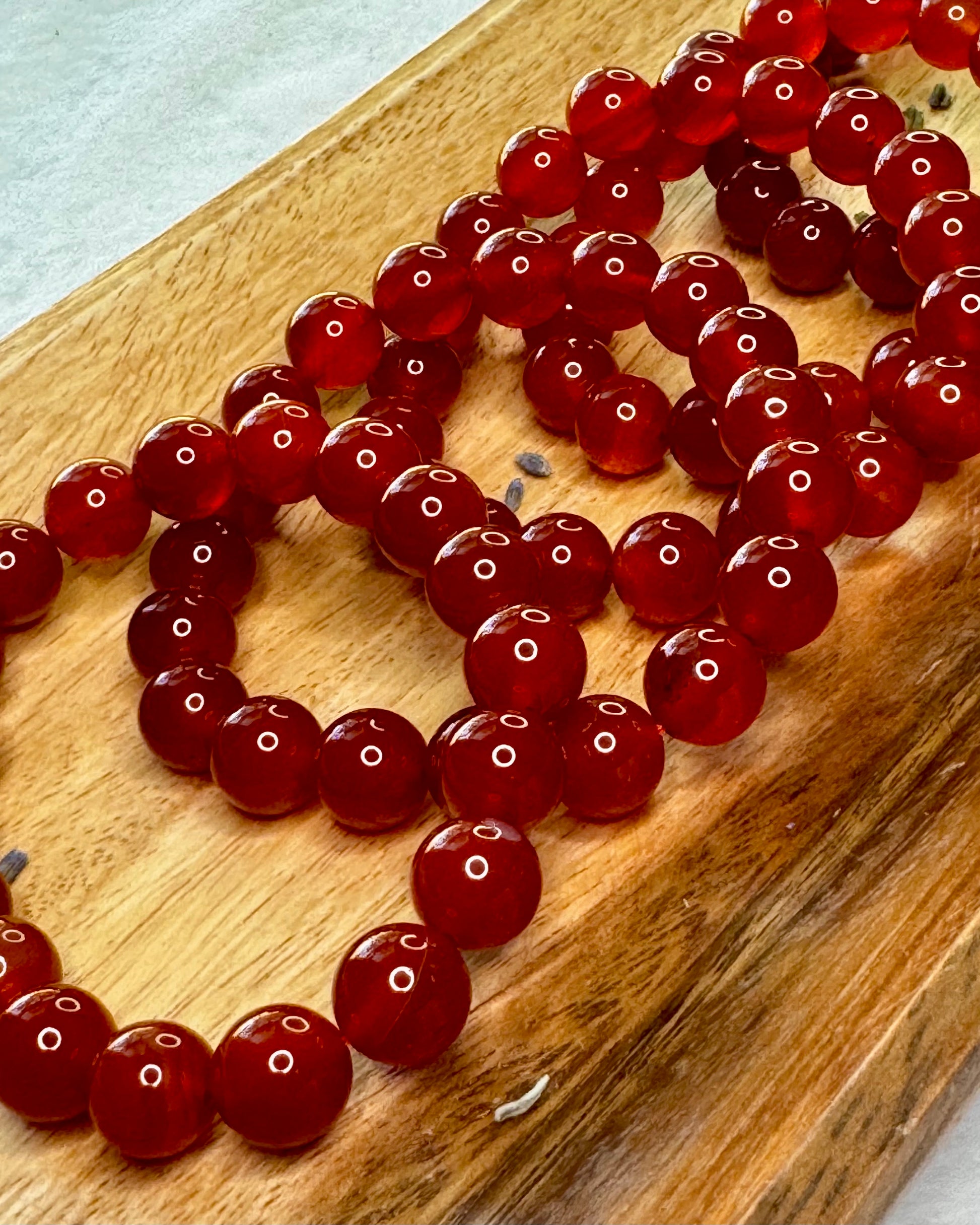 10mm Carnelian crystal bracelet symbolizing courage, vitality, and creative energy