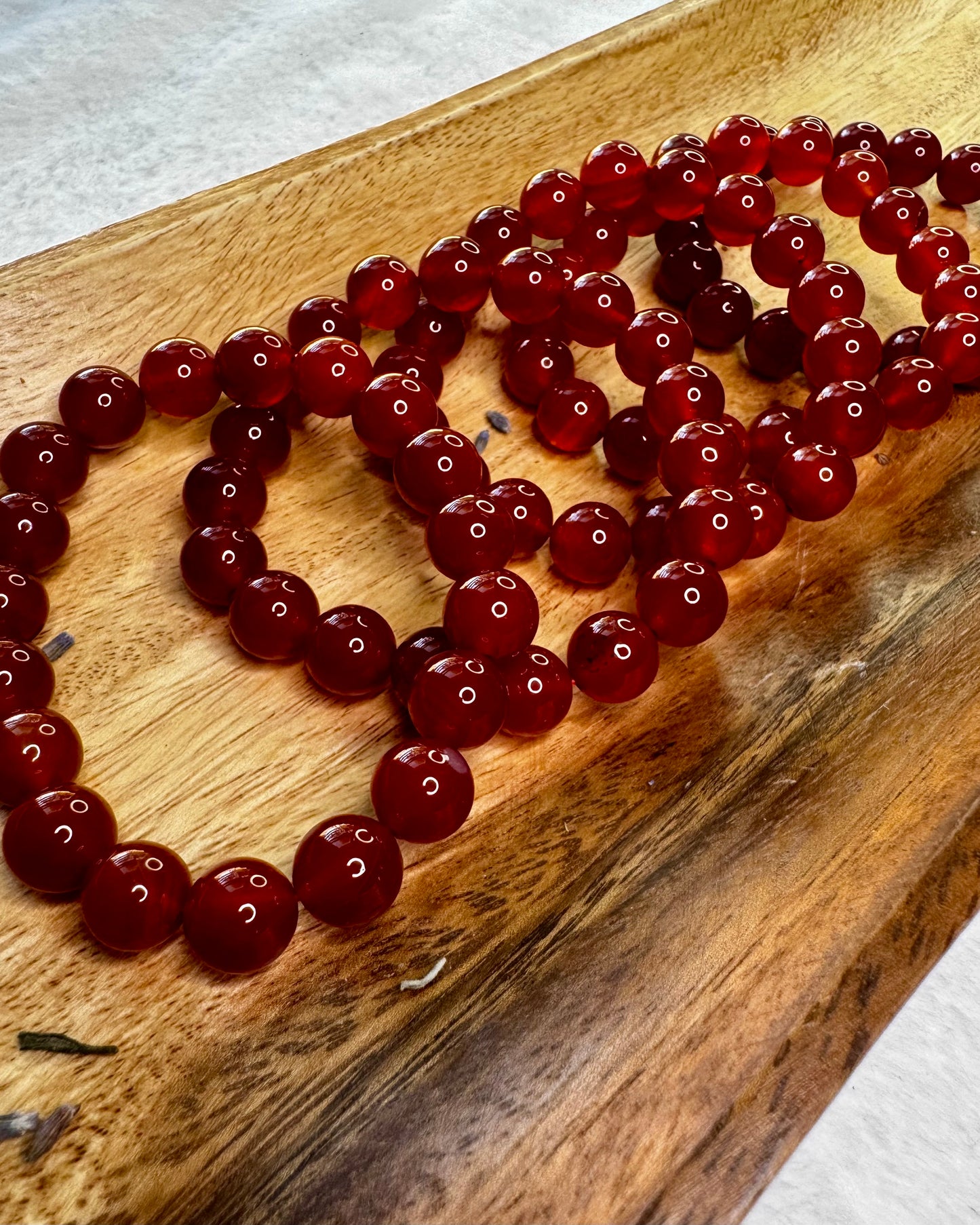 10mm Carnelian crystal bracelet symbolizing courage, vitality, and creative energy