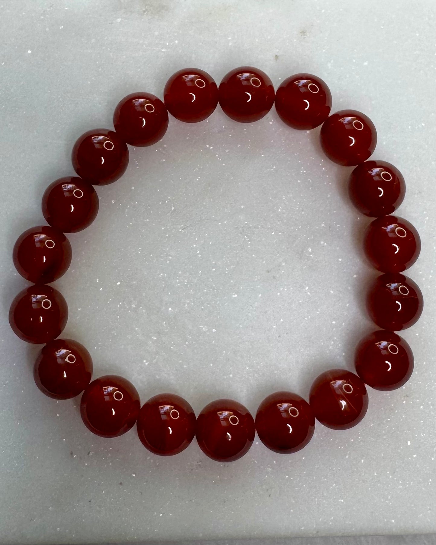 10mm Carnelian crystal bracelet symbolizing courage, vitality, and creative energy