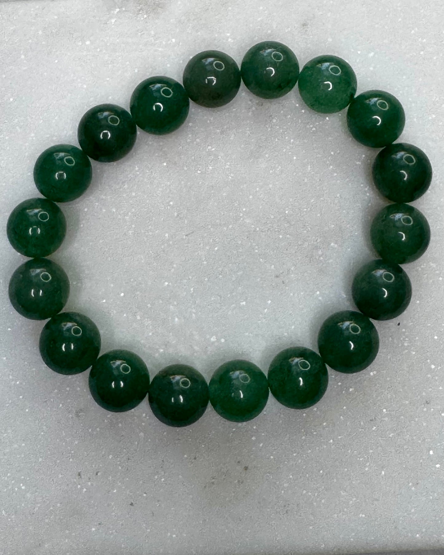 Natural Moss Agate beaded bracelet with 10mm stones for emotional healing and inner harmony.