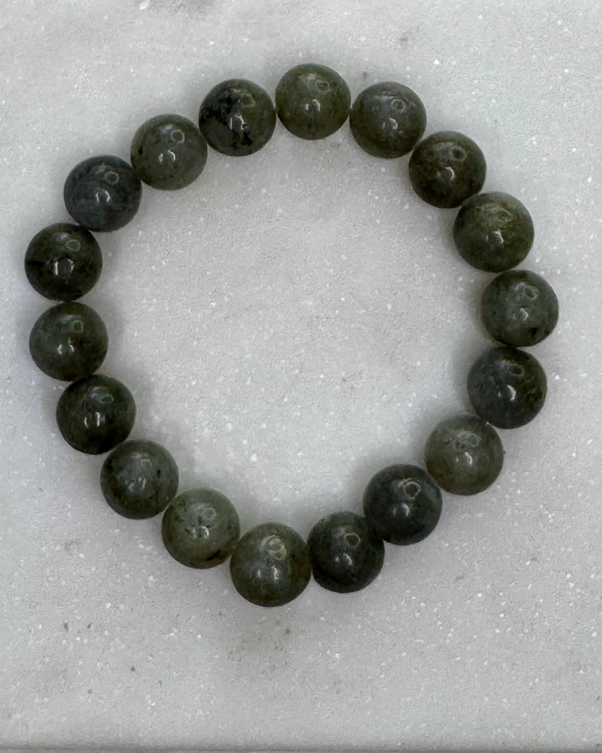 10mm Labradorite crystal bracelet promoting protection, intuition, and spiritual transformation.